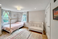 Full bedroom with crib