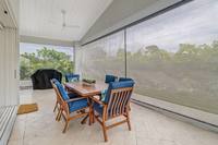 Storm shutters allow you to enjoy the patio regardless of the weather