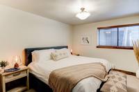 Another one of our suites comes with a luxury queen sized bed and bunk beds. All rooms have a private shower/restroom.