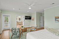 The upstairs deck provides views over the patio and off into the distance of beautiful Miramar FL. Accessed through the upstairs primary bedroom or staircase from backyard patio. 
| Emerald Palm by Boutiq Luxury Vacation Rentals | Miramar Beach, Florida
