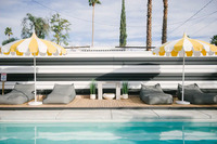 Relax by the pool on one of our four Article lounge cushions underneath classic Palm Springs cabana umbrellas.
| The Electric Lady by Boutiq Luxury Vacation Rentals | Palm Springs, California