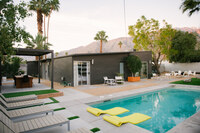 Dine outdoors around an Article dining table under a Sorara Pergola with adjustable roof and string lights, for perfect lighting any time of day/night.
| The Electric Lady by Boutiq Luxury Vacation Rentals | Palm Springs, California