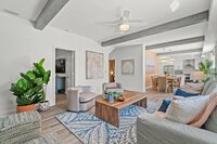 The living room is connected to both the dining room and kitchen, and has a door that leads into the social room.
| White Sands by Boutiq Luxury Vacation Rentals | Destin, Florida