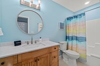 The primary bathroom is located steps away from the bedroom - perfect for those who want, or need, a little extra privacy. 
| White Sands by Boutiq Luxury Vacation Rentals | Destin, Florida