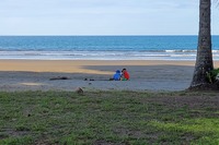 Kids playing in the beach sand