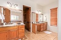 The primary bathroom features a double sink, walk-in closet, and a large, jacuzzi style tub, offering plenty of space and comfort for each person.
| The Sonoran by Boutiq Luxury Vacation Rentals | Scottsdale, Arizona